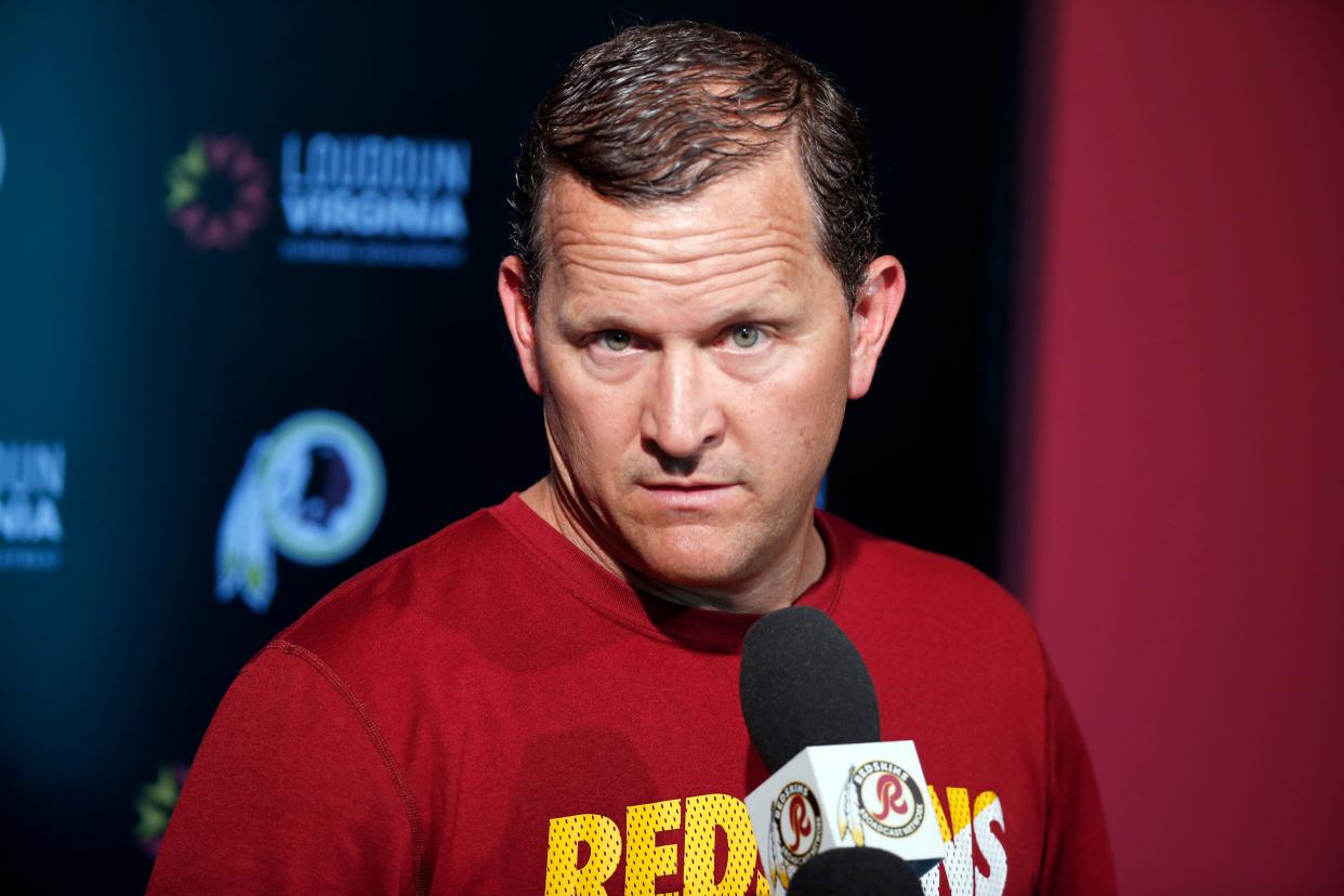 FILE - In this June 1, 2016 file photo, Washington Redskins defensive coordinator Joe Barry listens to a question during a media availability at the team's NFL football training facility at Redskins Park in Ashburn, Va. The Redskins have fired Barry and other members of the coaching staff.  (AP Photo/Alex Brandon, File)