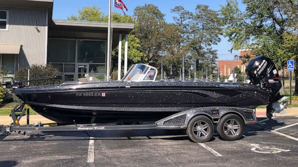 PHOTO: This undated photo provided by Cuyahoga County Prosecutor's Office shows a seized boat, trailer and fishing gear belonging to Chase Cominski that was seized on Oct. 11, 2022, in Pennsylvania. (Cuyahoga County Prosecutor's Office via AP)