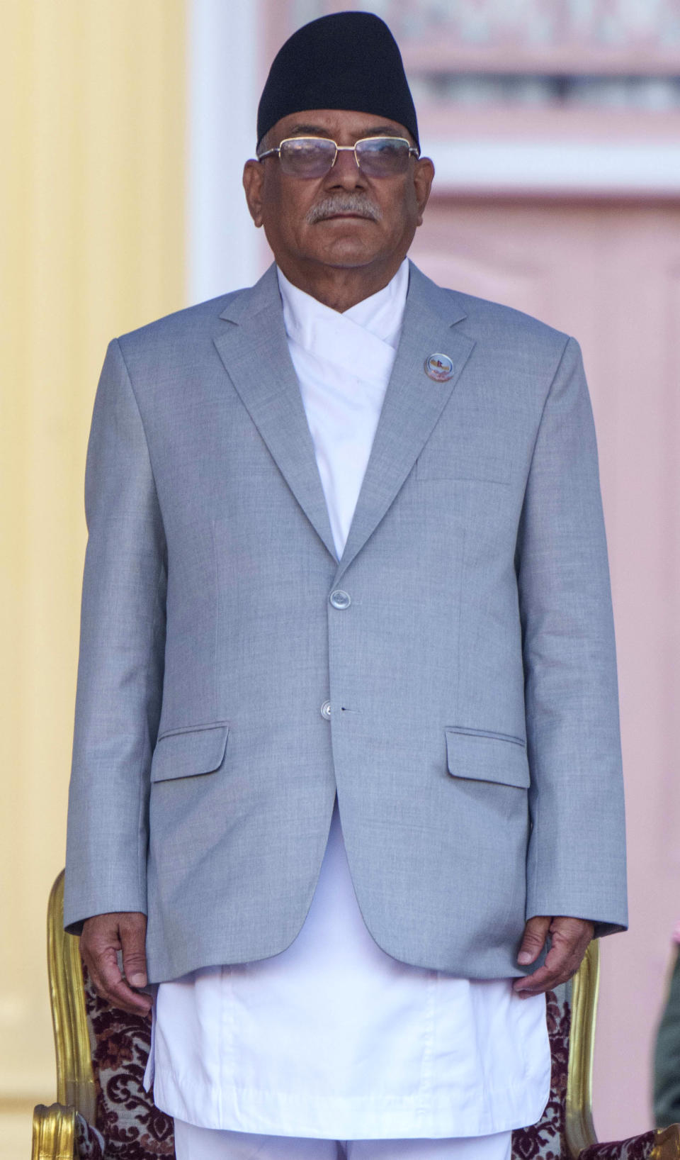 Nepal's newly elected prime minister Pushpa Kamal Dahal stands after he was sworn in by President Bidhya Devi Bhandari during a ceremony at the President House in in Kathmandu, Nepal, Monday, Dec. 26, 2022. Dahal has appointed three deputies and four other ministers in the Cabinet that is expected to be expanded in the next few days to accommodate more members from the seven parties in the new coalition government. (AP Photo/Niranjan Shrestha)