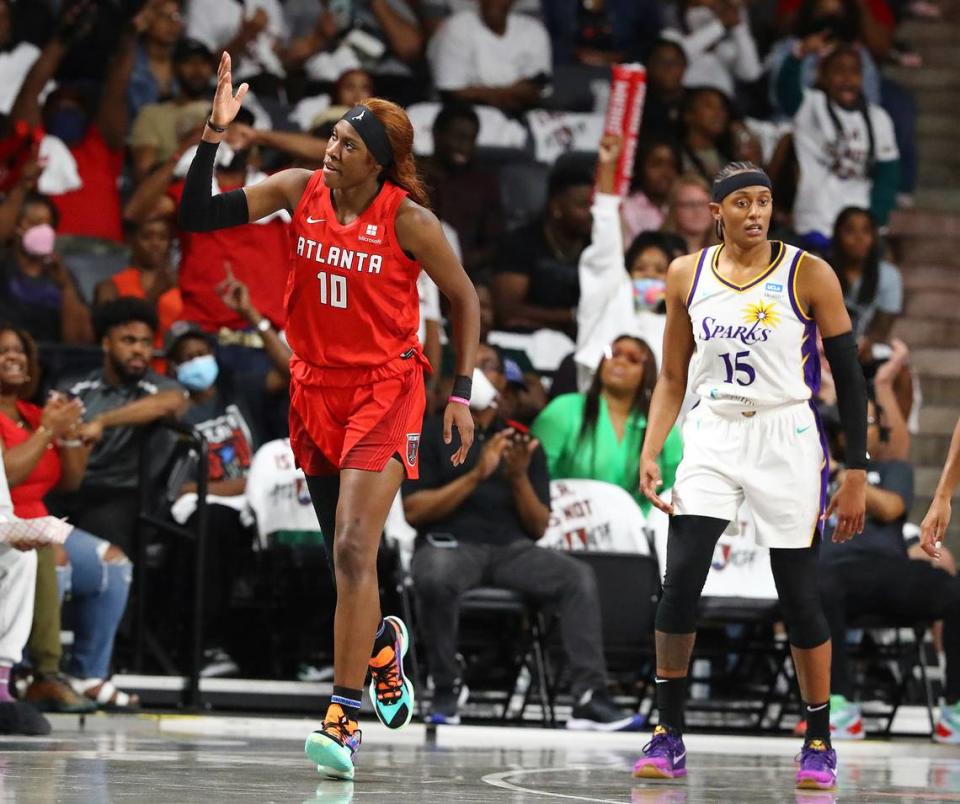 Atlanta Dream rookie Rhyne Howard reacts to hitting a three-pointer against the Los Angeles Sparks on May 11 in College Park, Ga.