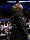 <p>Floyd Mayweather Jr. enters the ring before a super welterweight boxing match against Conor McGregor, Saturday, Aug. 26, 2017, in Las Vegas. (AP Photo/Isaac Brekken) </p>