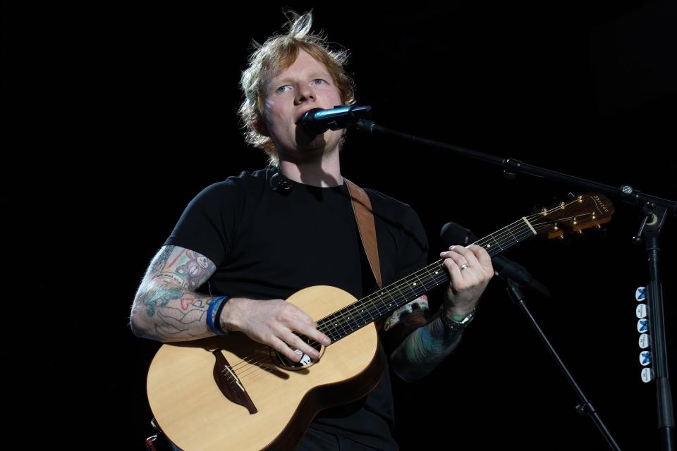 Ed Sheeran, seen here performing in 2022, will play Raymond James Stadium on May 20.