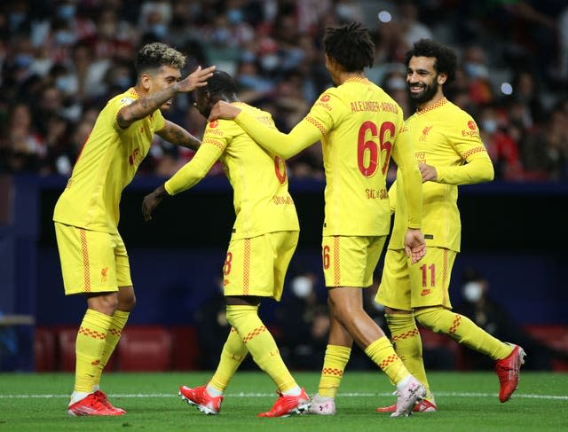 Naby Keita (second left) celebrates his goal for Liverpool