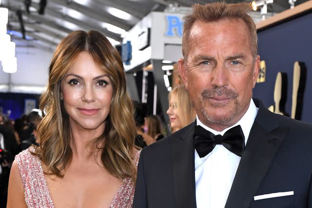 <p>Anthony Harvey/Shutterstock </p> Christine and Kevin Costner at the 2022 SAG Awards