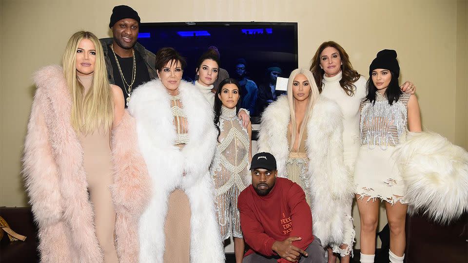 Lamar with the Kardashians at Kanye West's fashion show. Photo: Getty