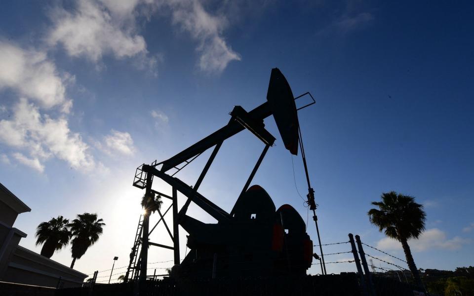 Oil West Texas Intermediate Brent crude Covid strain - FREDERIC J. BROWN/AFP via Getty Images