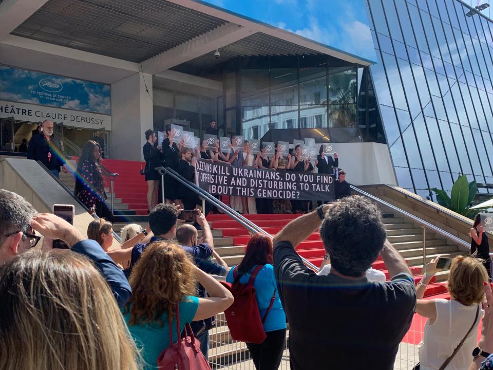 Cannes red carpet protest.