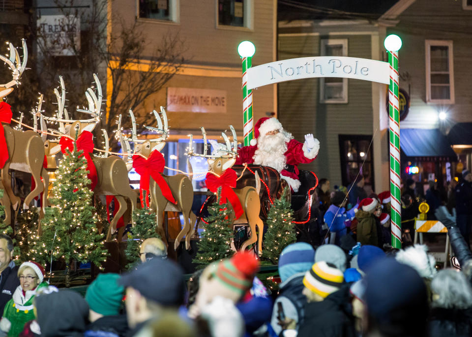 Santa arrives at the Exeter Bandstand during the town's Holiday Parade on Saturday, Dec. 4, 2021.