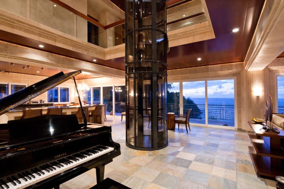 Hawaii’s Cliff-Top Waterfalling Estate