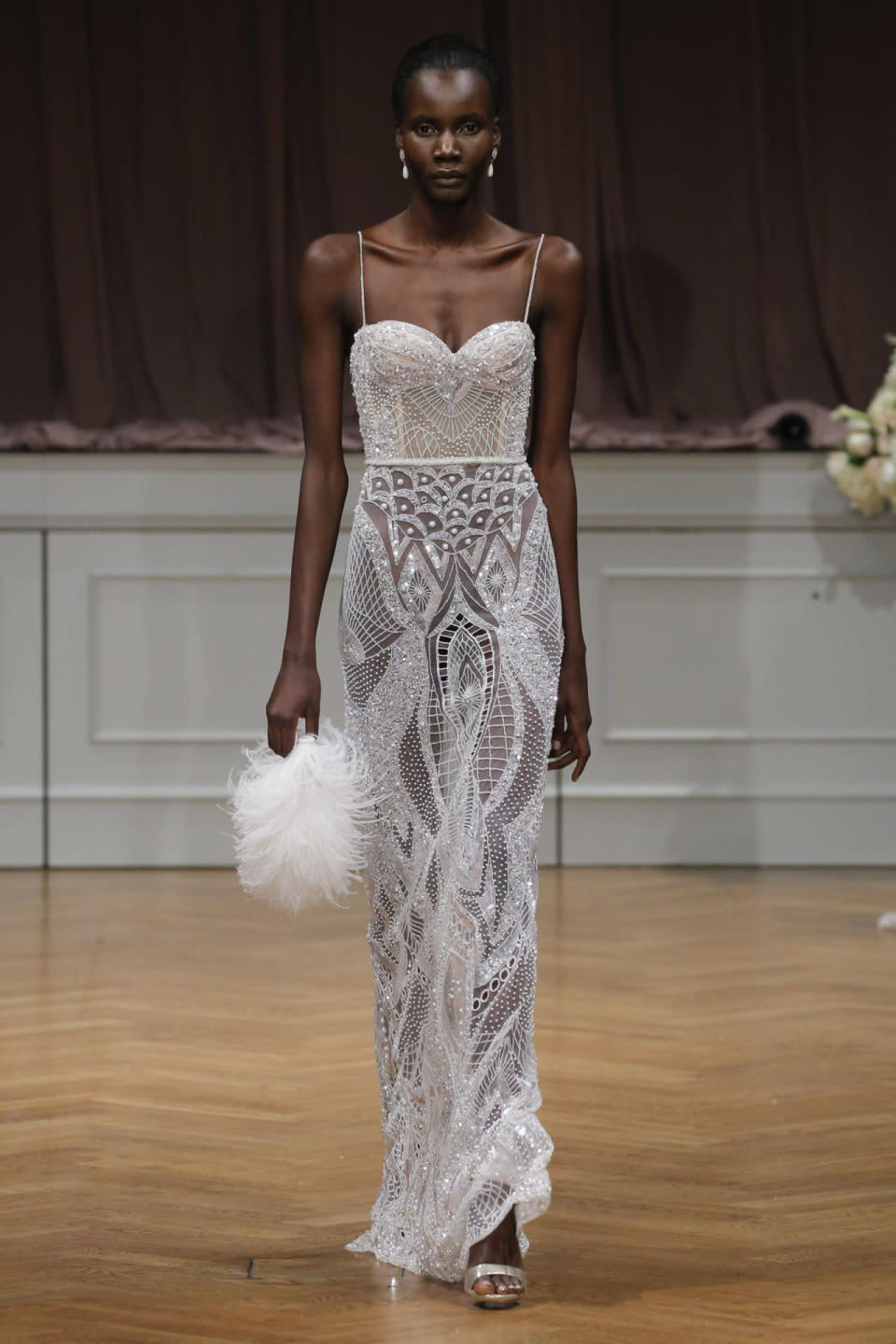 <p>A model wears a gown from the Alon Livne fall-winter 2017 bridal collection. </p><p><i>(Photo: Getty Images)</i></p>