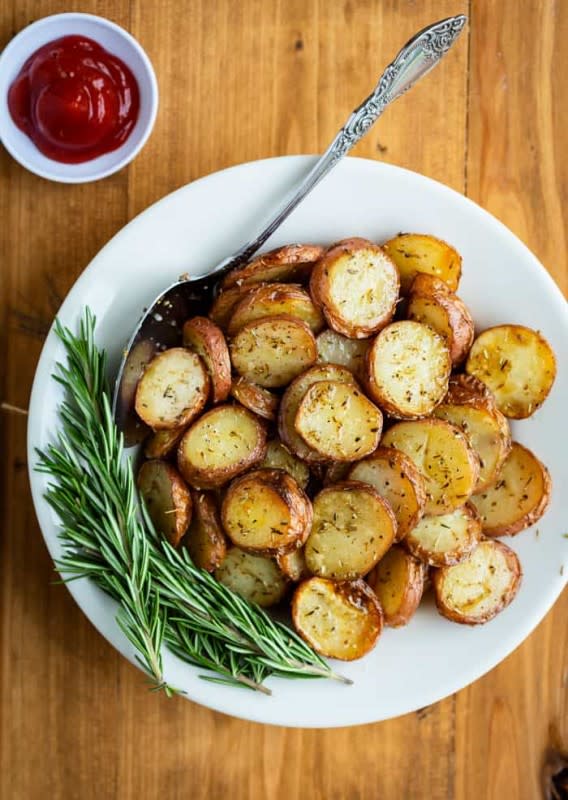 <p>The Cozy Cook</p><p>These crispy grilled potatoes are tossed in the best potato seasoning and cooked in foil. Enjoy perfectly crisp potatoes without heating up your kitchen!</p><p><strong>Get the recipe: <a href="https://thecozycook.com/grilled-potatoes" rel="nofollow noopener" target="_blank" data-ylk="slk:Grilled Red Potatoes;elm:context_link;itc:0;sec:content-canvas" class="link ">Grilled Red Potatoes</a></strong></p>