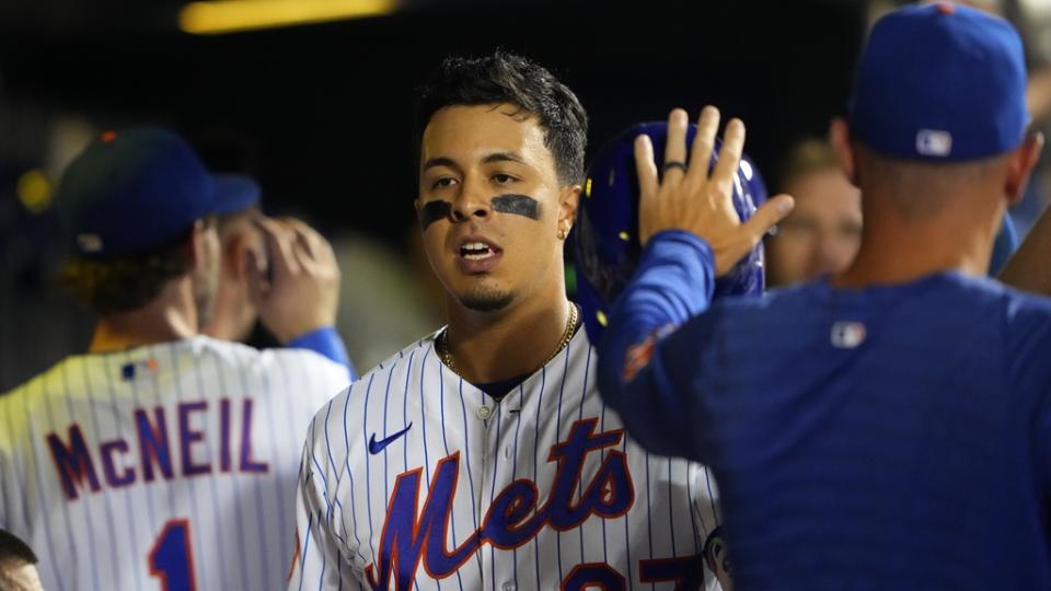 Sep 13, 2023; New York City, New York, USA; New York Mets designated hitter Mark Vientos (27) is congratulated by teammates for hitting a home run against the Arizona Diamondbacks during the sixth inning at Citi Field. Mandatory Credit: Gregory Fisher-USA TODAY Sports