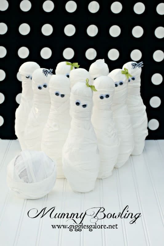 <p>Wrap store-brought bowling pins with toilet paper and add googly eyes to make marvelous mummies ready to be knocked over.</p><p><strong>Get the tutorial at <a href="http://porch.com/gigglesgalore/mummy-bowling-and/" rel="nofollow noopener" target="_blank" data-ylk="slk:Giggles Galore;elm:context_link;itc:0;sec:content-canvas" class="link ">Giggles Galore</a></strong>. </p><p><a class="link " href="https://www.amazon.com/Bowling-Plastics-Outdoor-Educational-Toddlers/dp/B0798MGJF2/ref=sr_1_2?dchild=1&keywords=bowling+pin+toys&qid=1626722811&sr=8-2&tag=syn-yahoo-20&ascsubtag=%5Bartid%7C10050.g.3476%5Bsrc%7Cyahoo-us" rel="nofollow noopener" target="_blank" data-ylk="slk:SHOP BOWLING SET;elm:context_link;itc:0;sec:content-canvas">SHOP BOWLING SET</a></p>