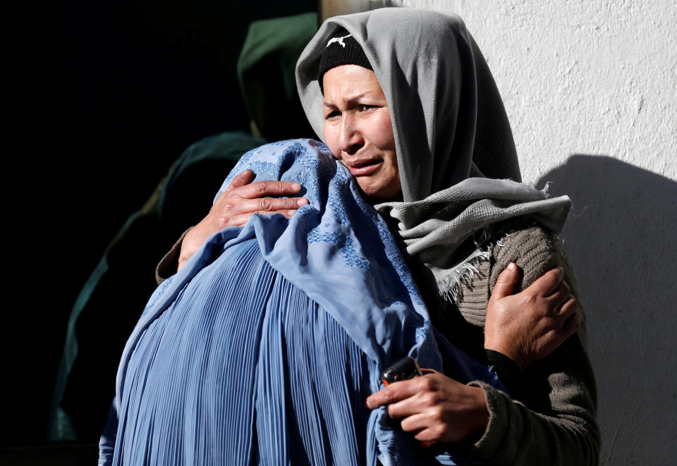 <p>Afghan women mourn inside a hospital compound after a suicide attack in Kabul, Afghanistan, Dec. 28, 2017 (Photo: Mohammad Ismail/Reuters) </p>