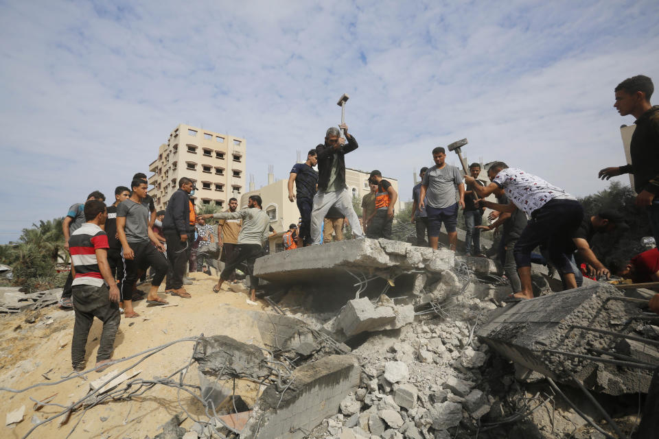 A search-and-rescue operation on Tuesday around a house in Deir-al Balah, Gaza Strip, that was destroyed after an Israeli attack. 