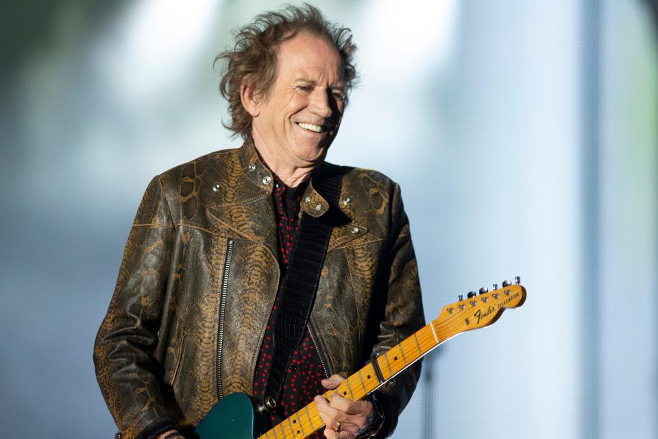 Rolling Stones guitarist Keith Richards performs at Soldier Field in Chicago on Friday.