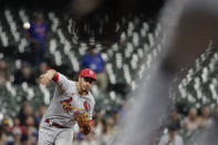 St. Louis Cardinals' Nolan Arenado throws out a runner at first base during the seventh inning of a baseball game against the Milwaukee Brewers, Monday, Sept. 20, 2021, in Milwaukee. (AP Photo/Aaron Gash)