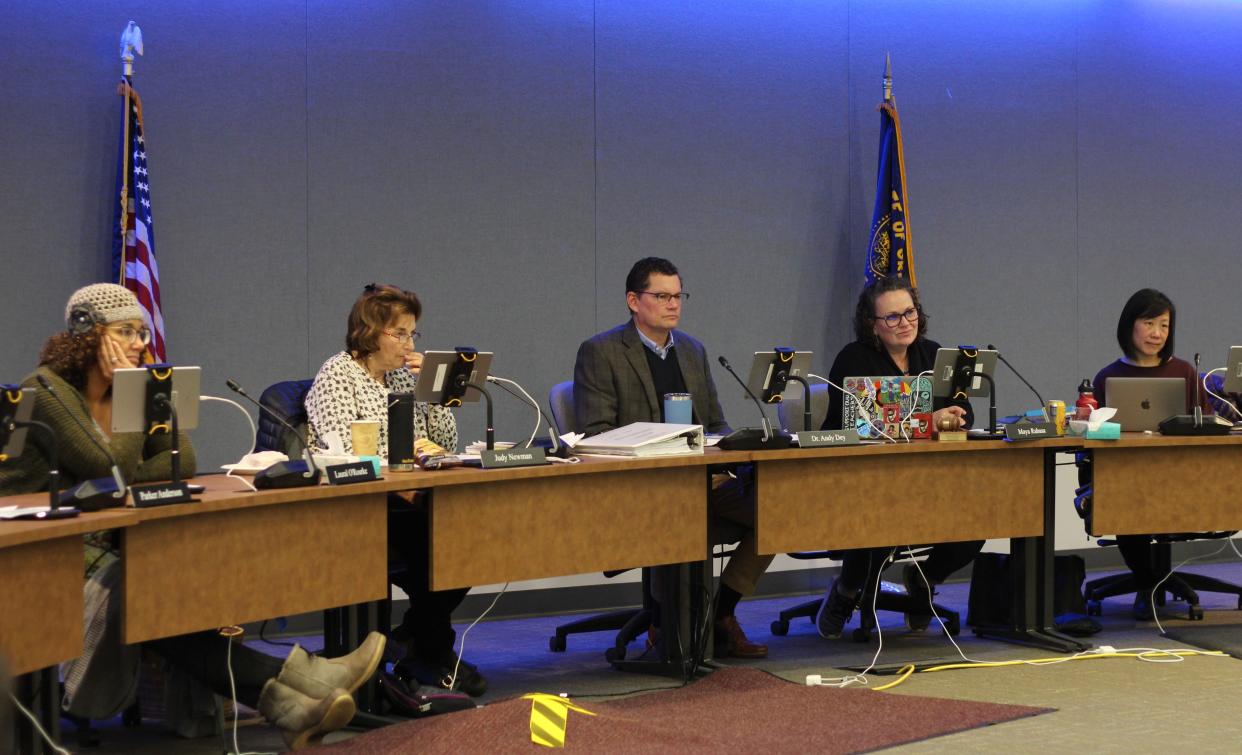 The Eugene School District 4J Board of Directors meets in the district office for a regular meeting on Jan. 18, 2023. Four board members attended in person.