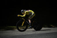 FILE - Denmark's Jonas Vingegaard, wearing the overall leader's yellow jersey, competes during the twentieth stage of the Tour de France cycling race, an individual time trial over 40.7 kilometers (25.3 miles) with start in Lacapelle-Marival and finish in Rocamadour, France, Saturday, July 23, 2022. (AP Photo/Daniel Cole, File)