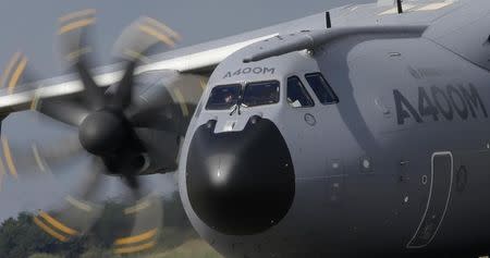 A new Airbus A400M military aircraft rolls on the runway after landing at Orleans air base, September 30, 2013. REUTERS/Christian Hartmann