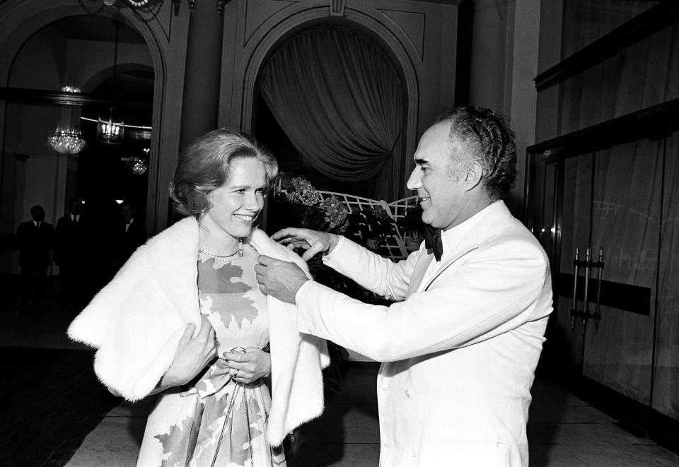 FILE - In this May 20, 1974 file photo, French actor Michel Piccoli talks with Swedish actress Liv Ullmann at the Cannes Film Festival, southern France. Michel Piccoli, a prolific screen star whose served as muse to filmmaker Luis Bunuel and was a leading man for Jean-Luc Godard, has died. He was 94. (AP Photo/Jean-Jacques Levy, File)