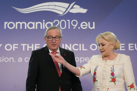 Romanian Prime Minister Viorica Dancila welcomes European Commission President Jean-Claude Juncker in Bucharest, Romania, January 11, 2019. Inquam Photos/Octav Ganea via REUTERS ATTENTION EDITORS - THIS IMAGE WAS PROVIDED BY A THIRD PARTY. ROMANIA OUT.