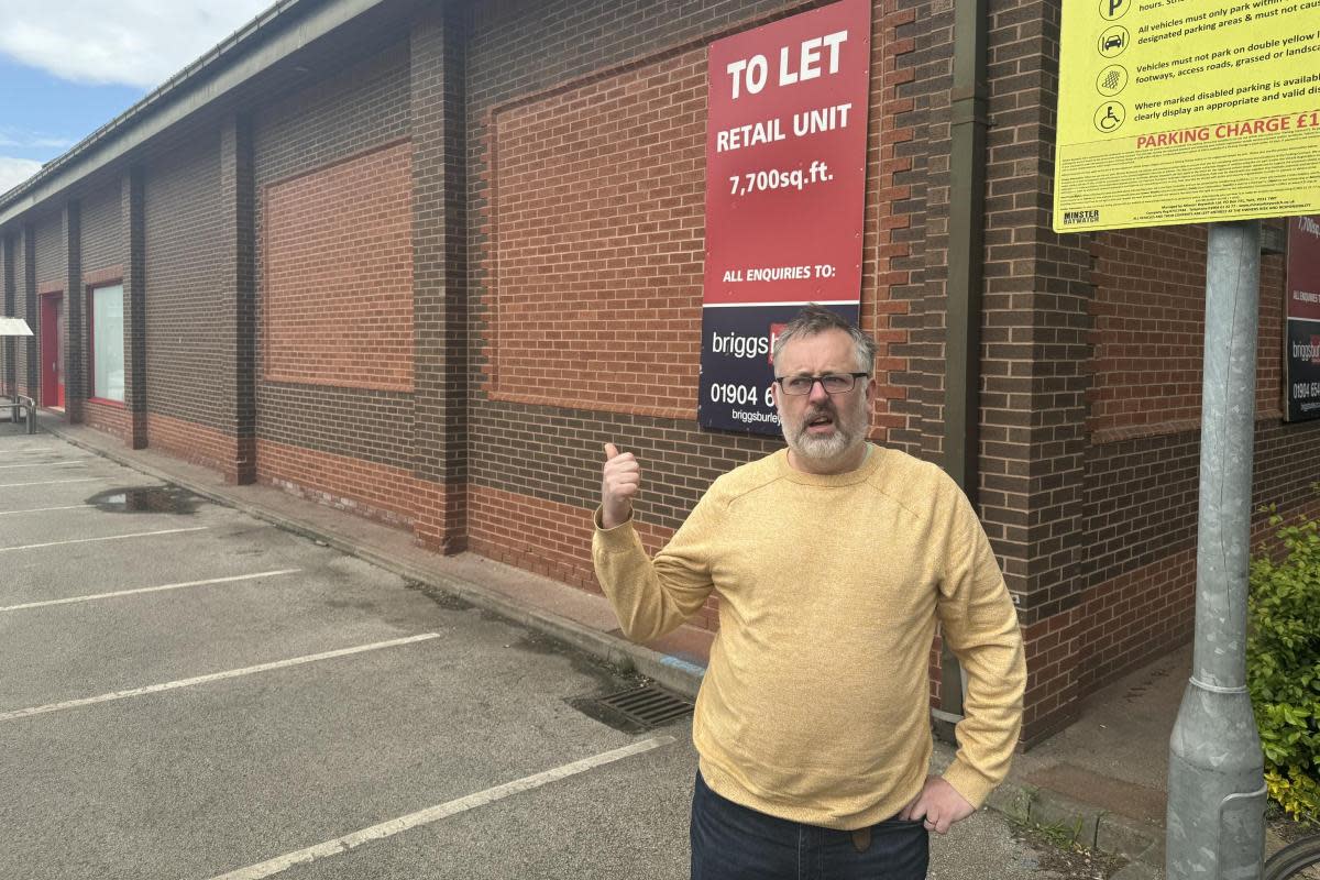 Joe Redshaw, who lives behind the development, is leading the campaign against a new McDonald's <i>(Image: Harry Booth)</i>