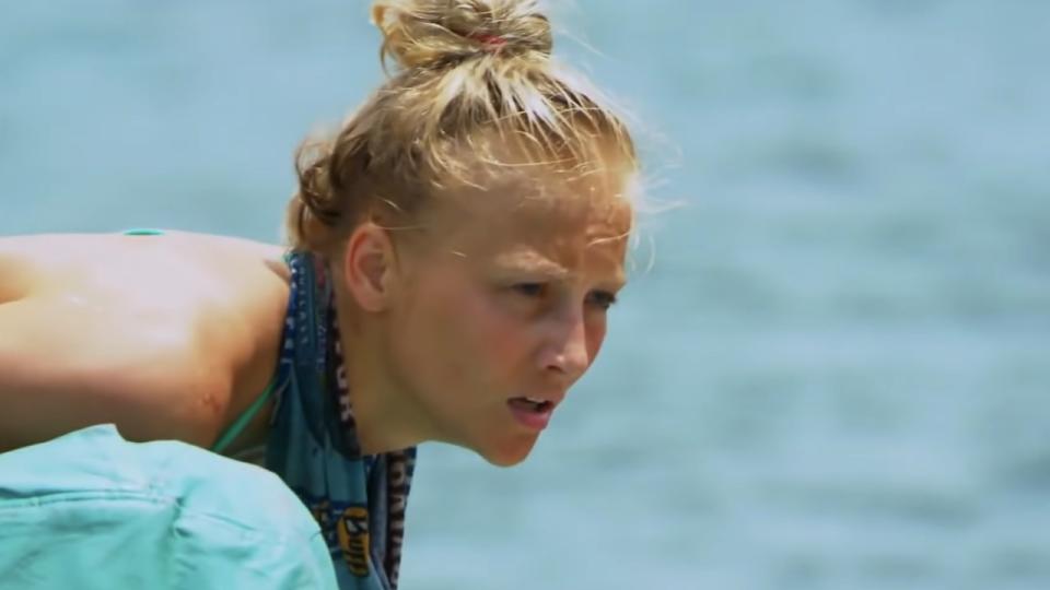 Kelley Wentworth in a challenge looking determined on Survivor