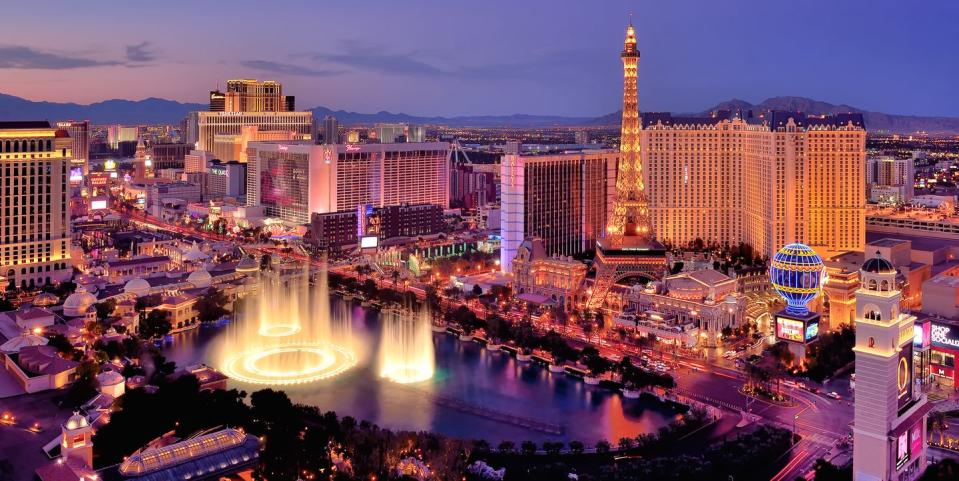 city skyline at night with bellagio hotel water fountains, las vegas, nevada, america, usa