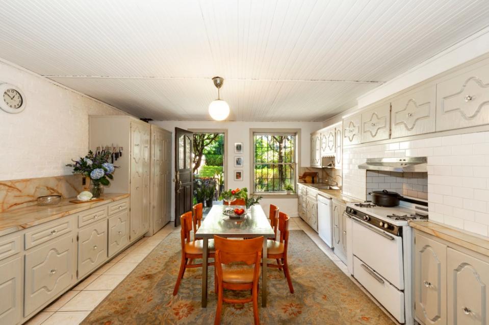 A dine-in kitchen area has windowed views. Geraldine Pierson