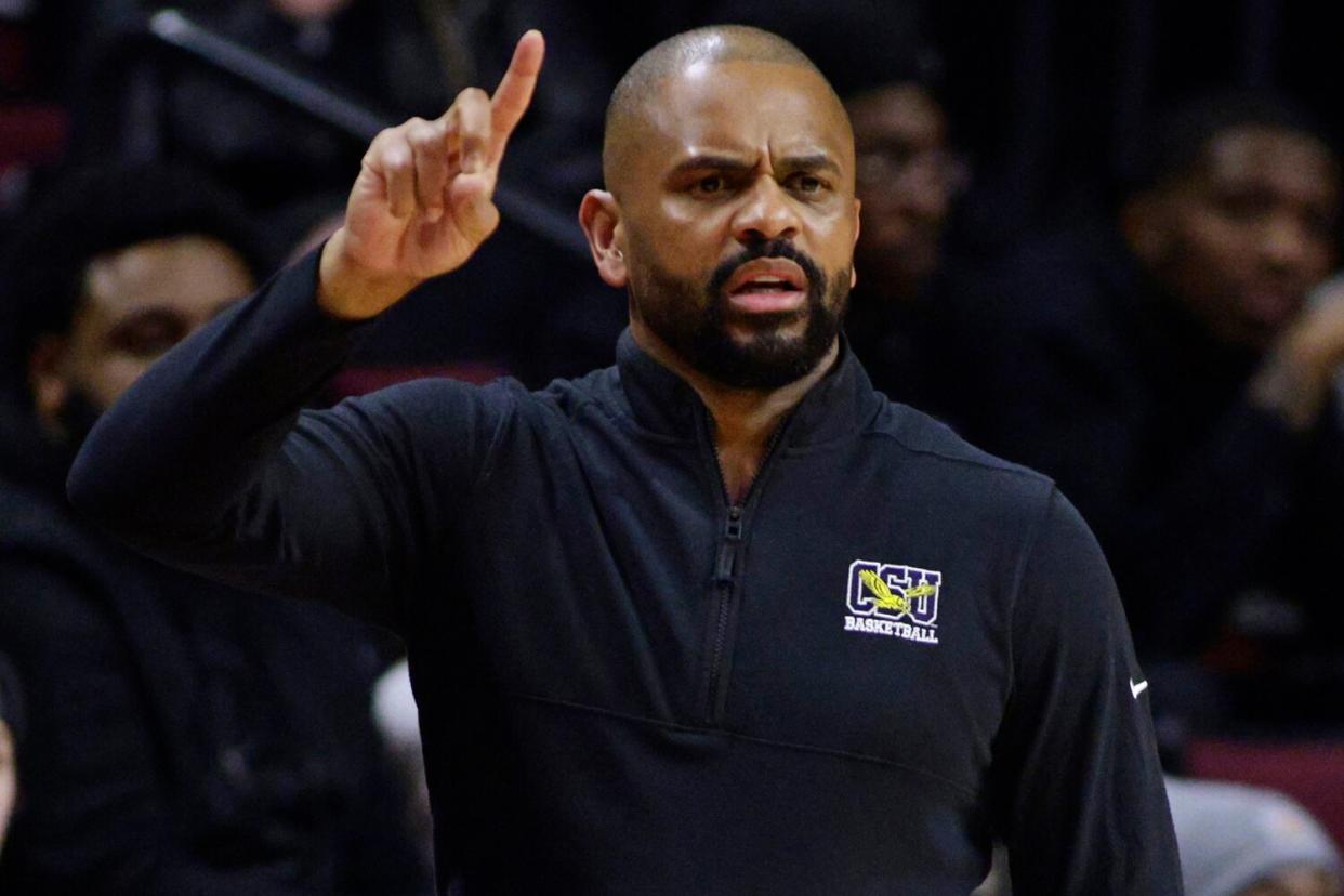 Head coach Juan Dixon of the Coppin State Eagles reacts during the second half of a game against the Rutgers Scarlet Knights at Jersey Mike's Arena on December 30, 2022 in Piscataway, New Jersey.