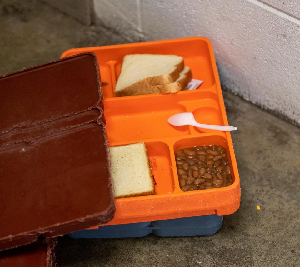 A meal tray holds plain bread, a sandwich and beans on Thursday, June 24, 2021, at the Allen County Jail in downtown Ft. Wayne.