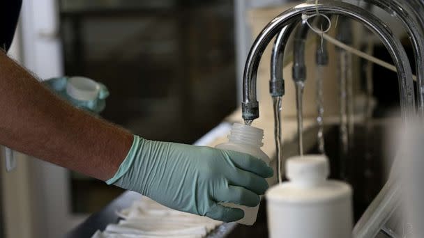 PHOTO: Geologist Ryan Bennett with the Illinois Environmental Protection Agency collects samples of treated Lake Michigan water in a laboratory at the water treatment plant in Wilmette, Illinois, July 3, 2021. (Tribune News Service via Getty Images, FILE)