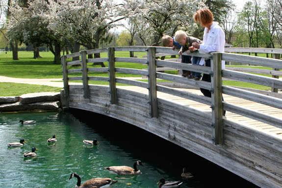 A woman enjoys the sunshine with two kids at a park in Columbus, Ohio. Sunnier weather may reduce the chance of ADHD in children, according to a study from the Ohio State University Wexner Medical Center.