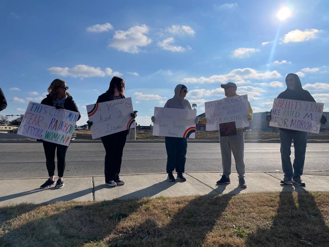 Dozens of protesters gathered outside the DoubleTree Hilton in Arlington on Sunday morning to protest against Stedfast Baptist Church, the organization preaching violent homophobia that has made the hotel its new home after being forced to leave a building in Watauga.