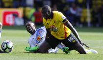 <p>Watford’s Abdoulaye Doucoure in action with Sunderland’s Jermain Defoe </p>