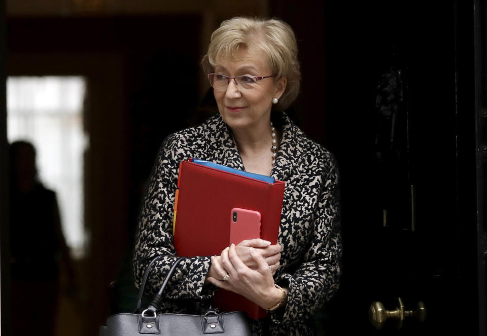 FILE - In this Tuesday, March 19, 2019 file photo, Britain's Andrea Leadsom the Leader of the House of Commons leaves a cabinet meeting at 10 Downing Street in London. Prime Minister Theresa May’s announcement that she will leave 10 Downing Street has set off a fierce competition to succeed her as Conservative Party leader _ and as the next prime minister.  (AP Photo/Matt Dunham, File)