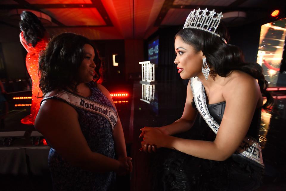 Celinda Ortega, Miss New Jersey USA 2021 talks to a beauty pageant contestant after the Preliminary Judging of the Miss NJ USA 2022 Pageant ended at Hilton Parsippany in Parsippany, Saturday on 04/2/22.