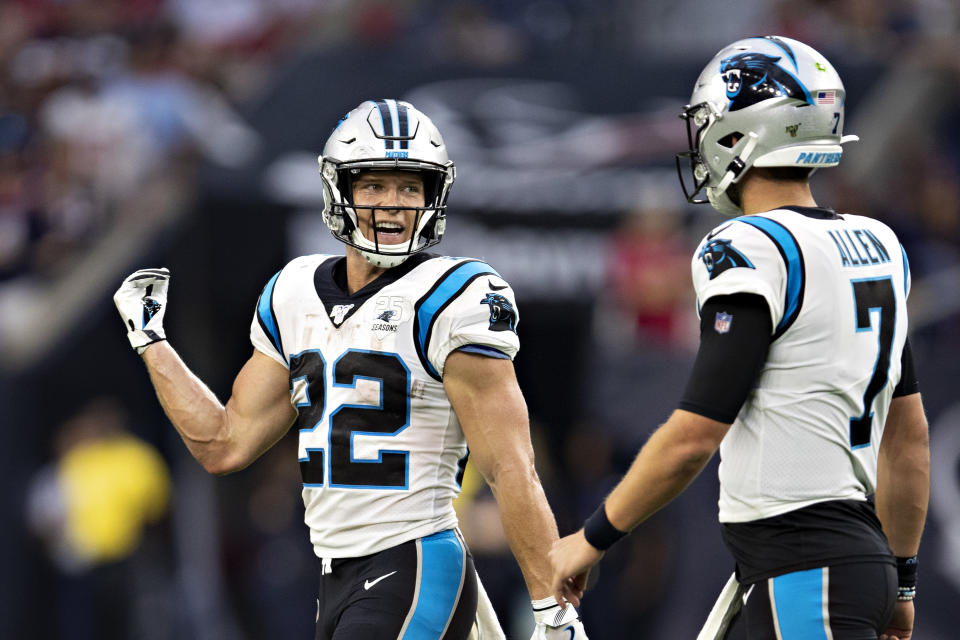 HOUSTON, TX - SEPTEMBER 29:  Christian McCaffrey #22 talks with Kyle Allen #7 of the Carolina Panthers during a game against the Houston Texans at NRG Stadium on September 29, 2019 in Houston, Texas.  The Panthers defeated the Texans 16-10.  (Photo by Wesley Hitt/Getty Images)