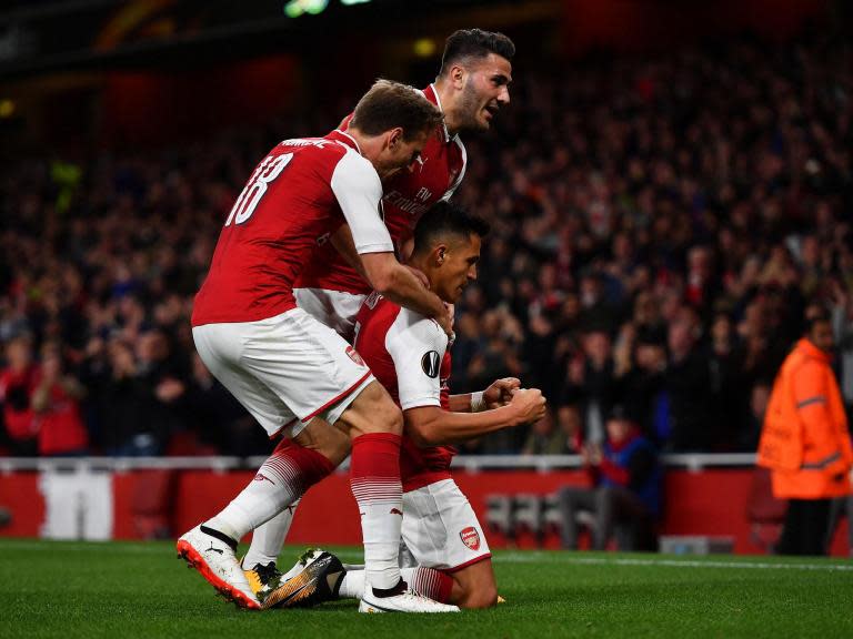 Arsenal overcome night of chaos at the Emirates to down Cologne in Europa League opener