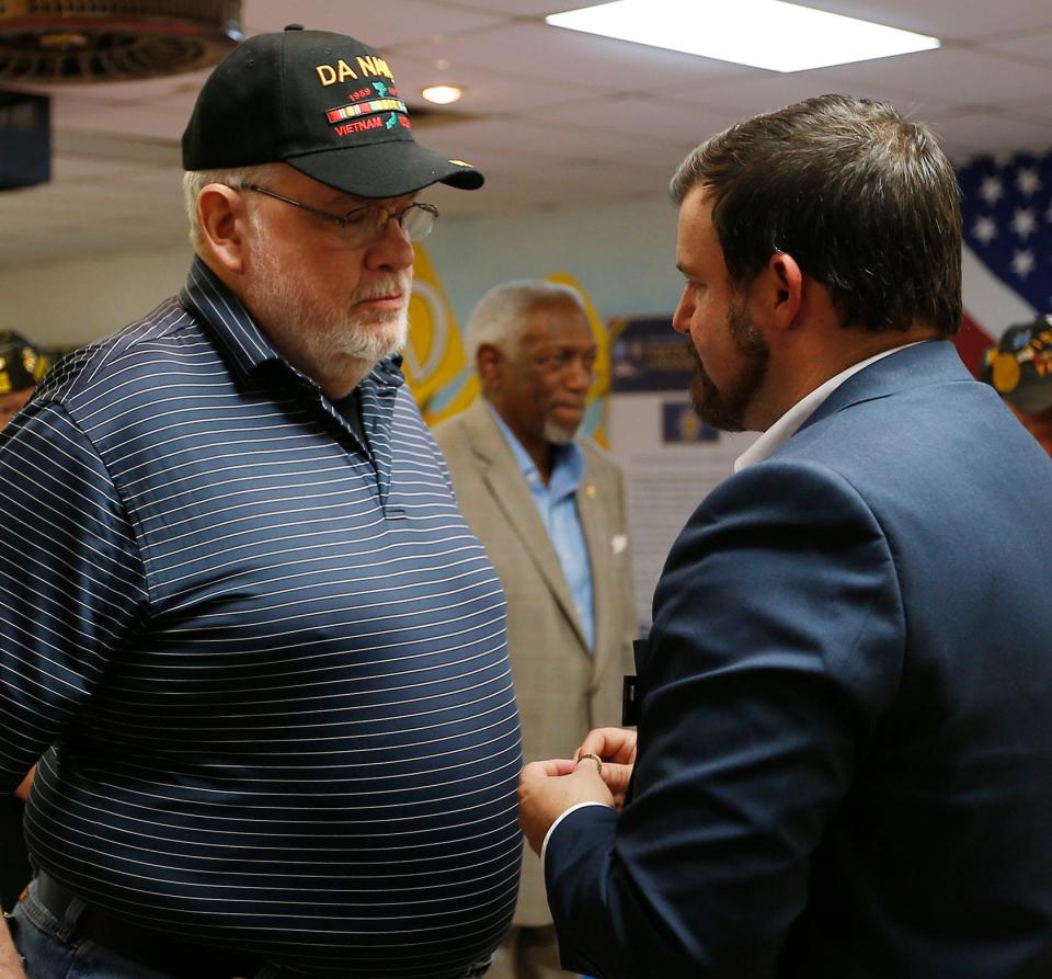 Charles Silmon chats with Ryan Rose, who served as the keynote speaker, during the Vietnam War Commemorative pin ceremony held at Jim Taylor VFW Post 8845 on June 16, 2022, in Fort Smith.