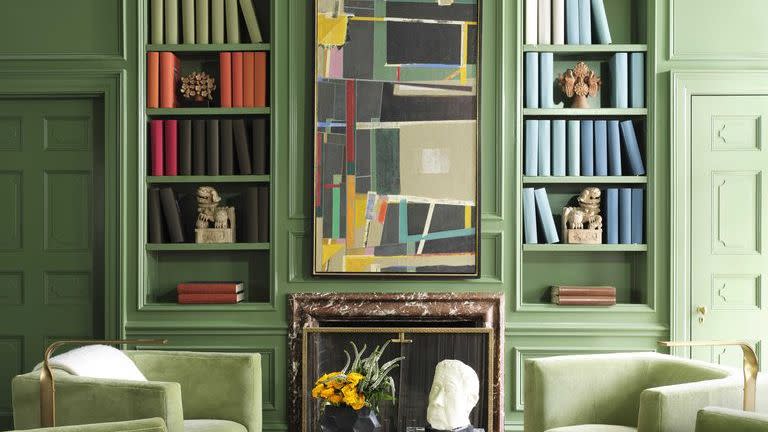 green library, fireplace, stone coffee table