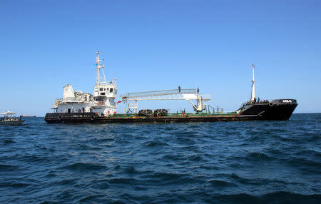 Maritime police are seen aboard oil tanker Aris-13, which was released by pirates, as it sails to dock on the shores of the Gulf of Aden in the city of Bosasso, northern Somalia's semi-autonomous region of Puntland, March 19, 2017. REUTERS/Abdiqani Hassan FOR EDITORIAL USE ONLY. NO RESALES. NO ARCHIVES