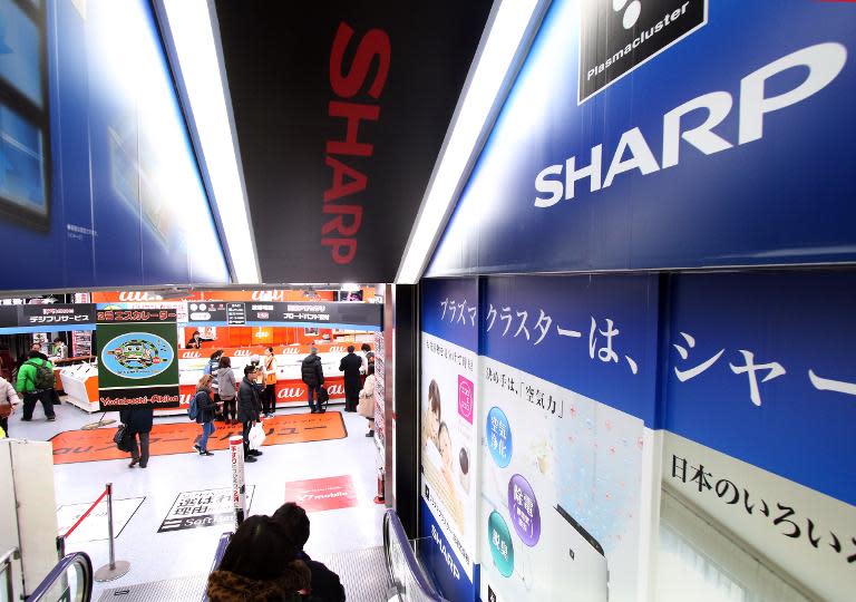 Shares in Sharp tumbled nearly 10 percent in early trade after the Nikkei business daily reported that the struggling electronics maker plans to request aid
