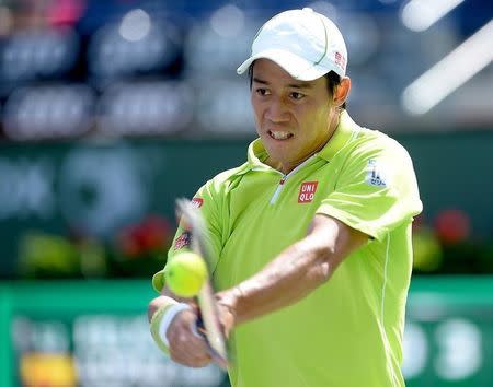 Mar 18, 2015; Indian Wells, CA, USA; Kei Nishikori (JPN) during his match against Feliciano Lopez (ESP) in the BNP Paribas open at the Indian Wells Tennis Garden. Mandatory Credit: Jayne Kamin-Oncea-USA TODAY Sports