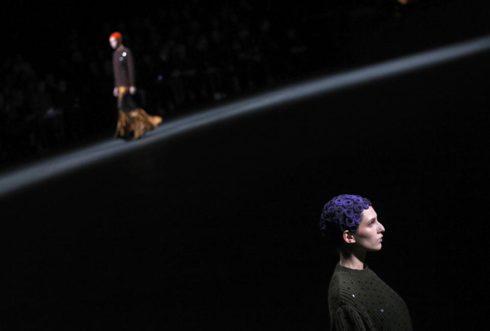 Models wear creations by designer Riccardo Tisci for Givenchy as part of his Fall/Winter 2013-2014 ready to wear collection, in Paris, Sunday, March, 3, 2013. (AP Photo/Christophe Ena)