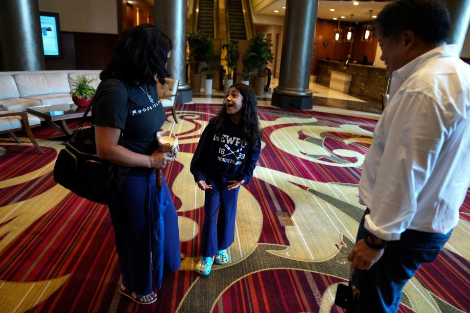 Journal Executive Editor David Ng greets Meera and her mom in the lobby of the Omni Providence Hotel.