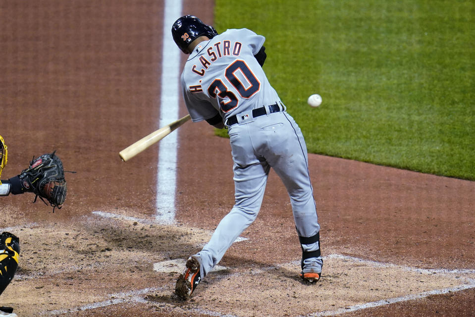 Detroit Tigers' Harold Castro hits a two-run double off Pittsburgh Pirates starting pitcher Jose Quintana during the fourth inning of a baseball game in Pittsburgh, Tuesday, June 7, 2022. (AP Photo/Gene J. Puskar)