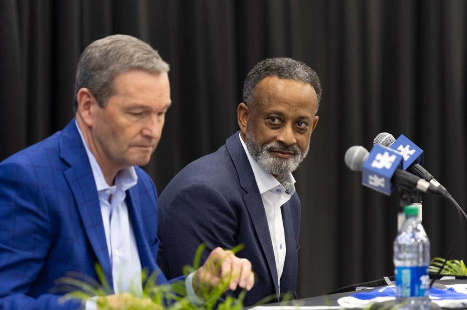 Kentucky athletics director Mitch Barnhart, left, speaks about Kenny Brooks during his introductory press conference as the Kentucky women’s basketball coach last month. Since taking the UK job on March 26, Brooks has already radically altered the paradigm for the Kentucky program.