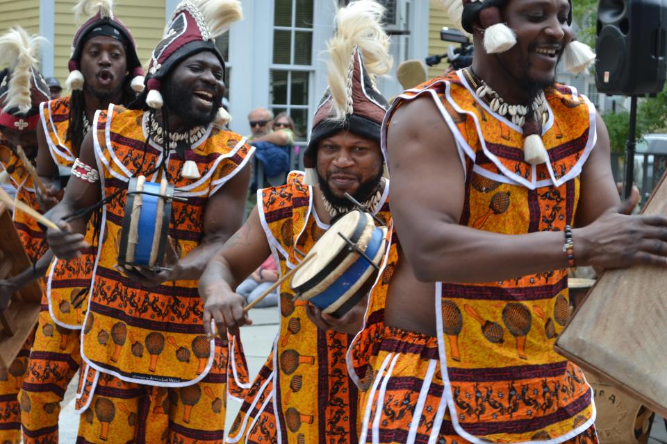 Members of the Akwaabe Ensemble perform during the Juneteenth ceremony in Portsmouth Monday, June 19, 2023.